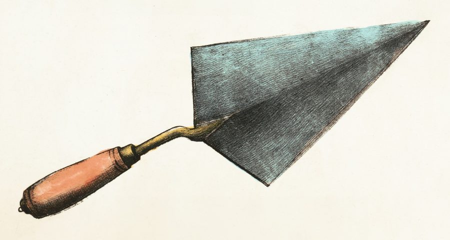 An old pointed trowel with a wooden handle